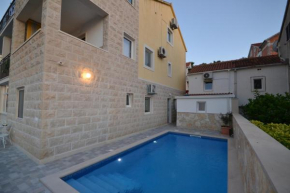 Family friendly apartments with a swimming pool Postira, Brac - 10271